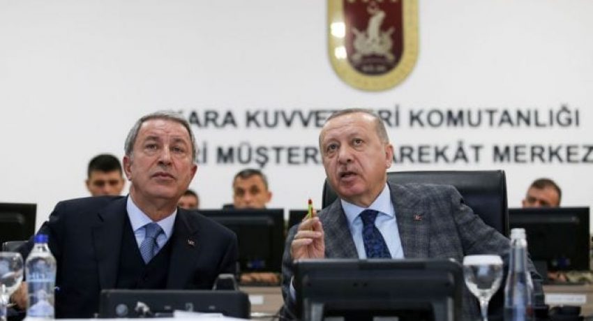 FILE PHOTO: Turkish President Tayyip Erdogan and Defence Minister Hulusi Akar attend a briefing at the Land Forces' Forward Joint Operation Command Center in Sanliurfa, Turkey, November 3, 2019. Murat Kula/Presidential Press Office/Handout via REUTERS. THIS IMAGE HAS BEEN SUPPLIED BY A THIRD PARTY./File Photo