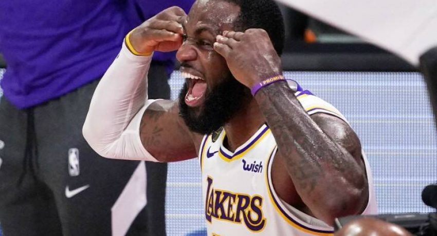 Los Angeles Lakers' LeBron James (23) celebrates after the Lakers defeated the Miami Heat 103-88 in Game 6 of basketball's NBA Finals Sunday, Oct. 11, 2020, in Lake Buena Vista, Fla. (AP Photo/Mark J. Terrill)