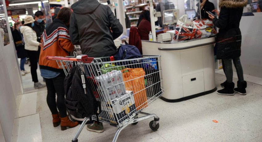 People shop at a Sainsbury's store, amid the coronavirus disease (COVID-19) outbreak, in London, Britain December 21, 2020. REUTERS/Hannah McKay