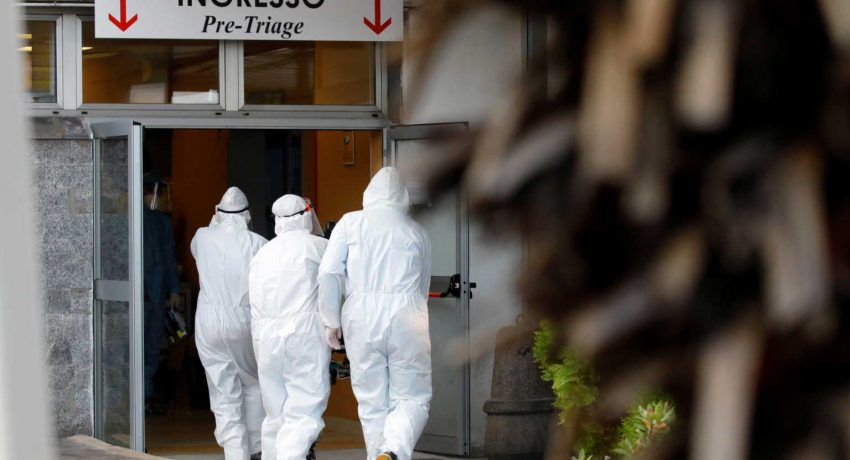 Medical workers are seen at the entrance of the Cardarelli hospital, amid the outbreak of the coronavirus disease (COVID-19), in Naples, Italy, November 12, 2020. REUTERS/Ciro De Luca