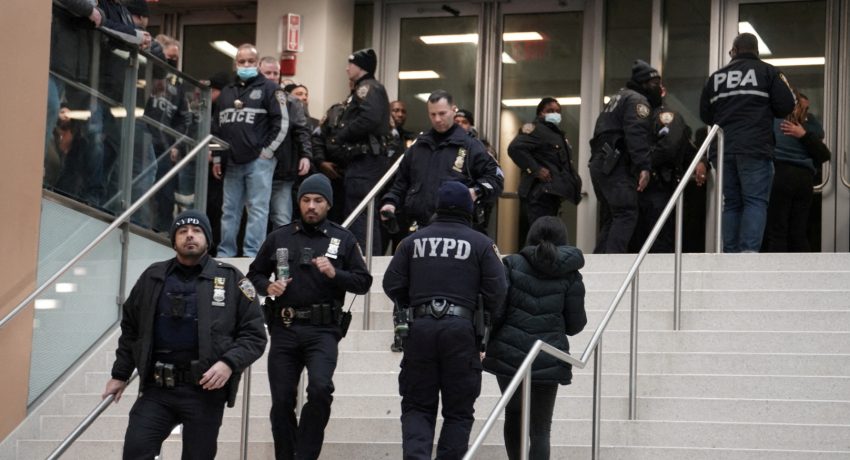 Police gather at a hospital near where NYPD officers were shot while responding to a domestic violence call in the Harlem neighborhood of New York City, U.S., January 21, 2022.   REUTERS/Dieu-Nalio Chery REFILE - CORRECTING LOCATION