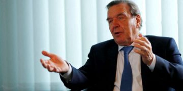 FILE PHOTO: Former German Chancellor Gerhard Schroeder is pictured during an interview with Reuters in his office in Berlin, Germany, November 15, 2018. Picture taken November 15, 2018.   REUTERS/Fabrizio Bensch/File Photo